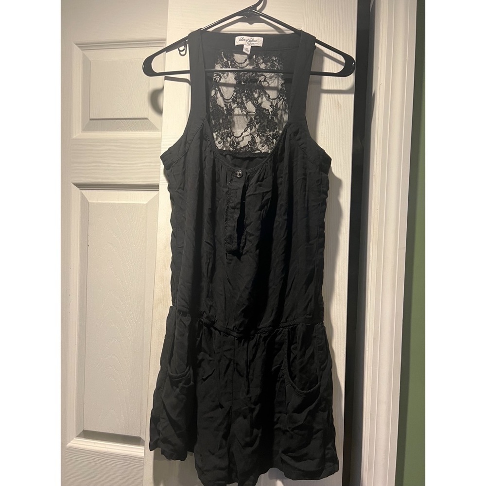 Black romper with lace back​​